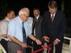 pastor Riyad Haddad cutting the ribbon for the Nazareth center for christian studies