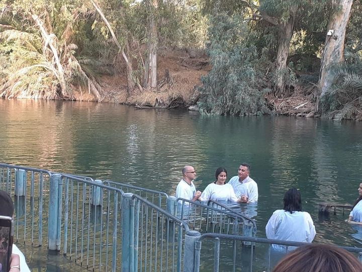 pastor hanna baptizing his daughter Abigail