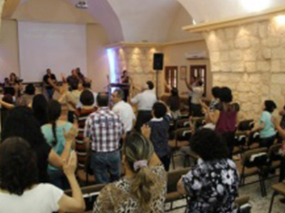 worship service at the baptist church in kufur yassif