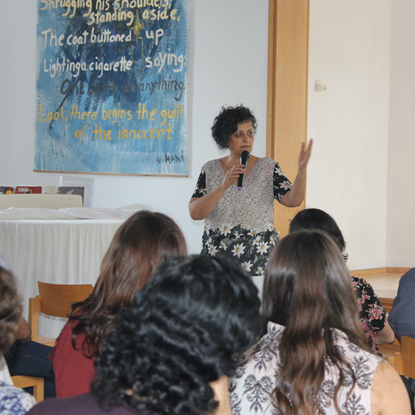 Daad odeh coordinator of the family ministry sharing during a training