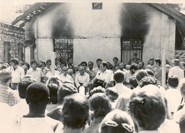 Praying at the Jerusalem Baptist Church after arson attack, 1982