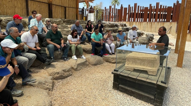 pastors and their spouses intently learning about the different aspects of the location where new testament stories took place