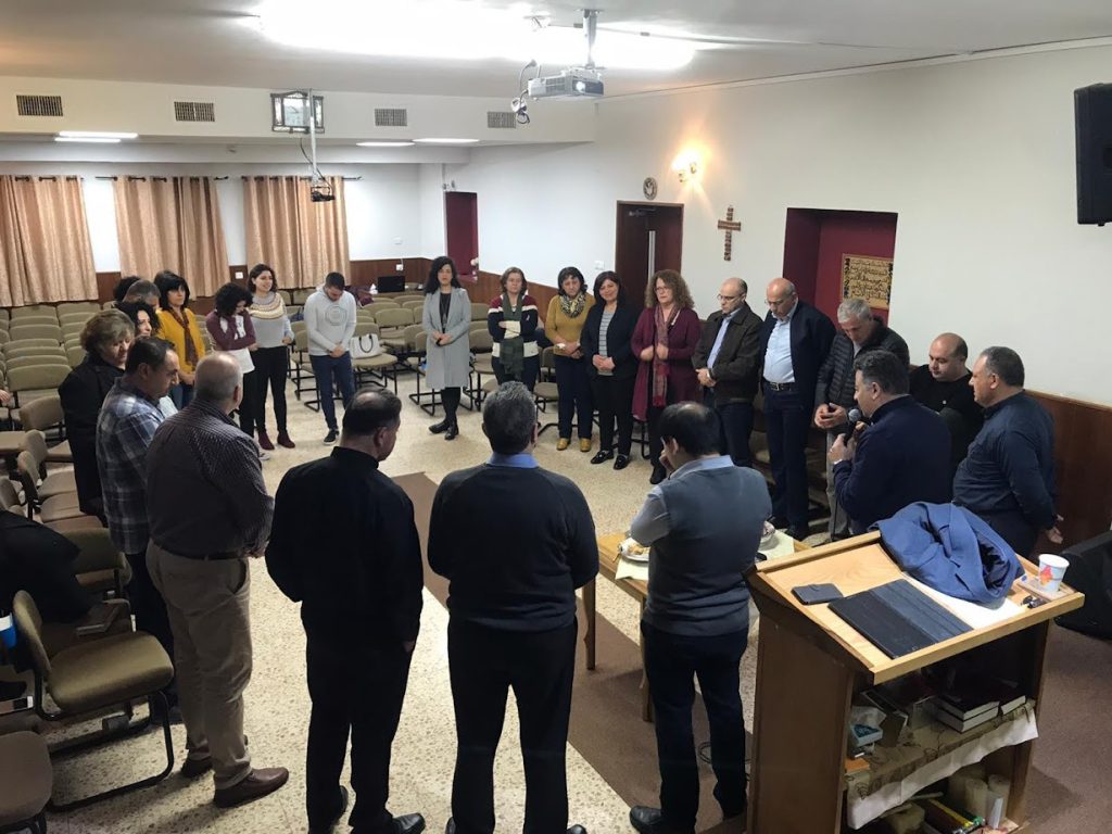 Prayer meeting in Tur'an church with servants, pastors and their wives